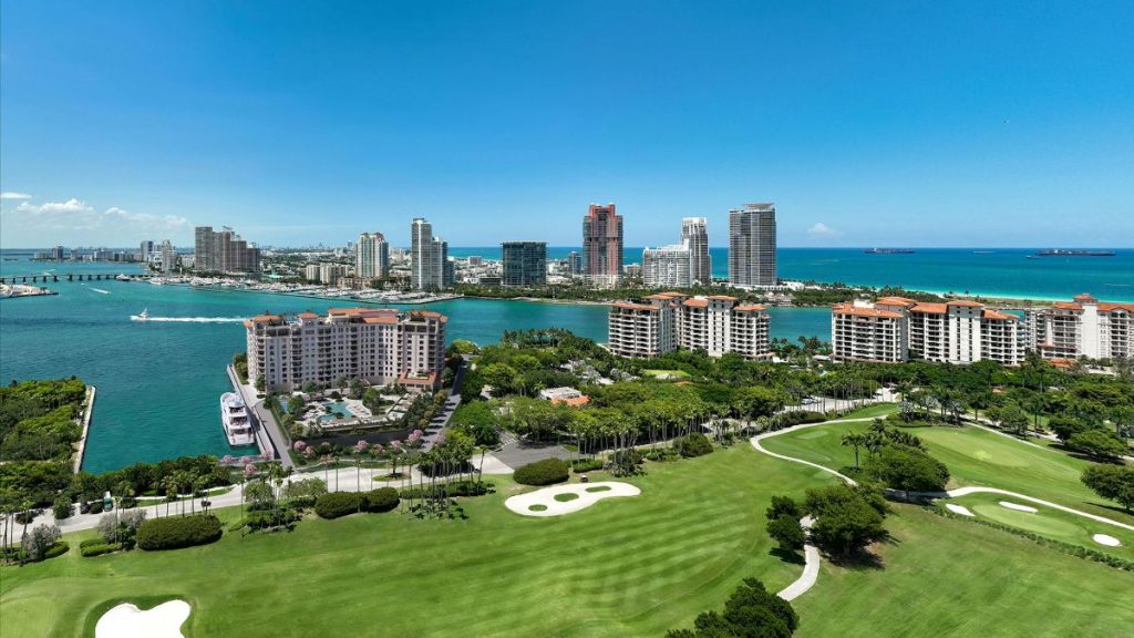 Fisher Island aerial showing the island, Miami Beach and Biscayne Bay