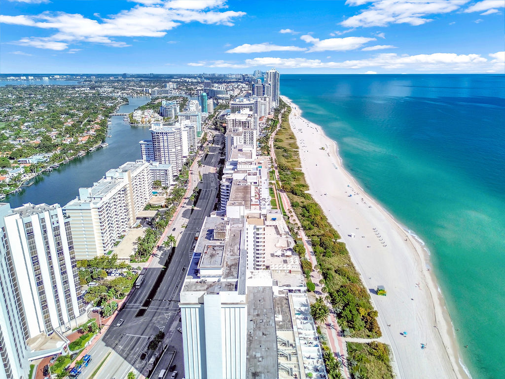 Mid-Beach Miami condos down Collins Avenue Aerial North